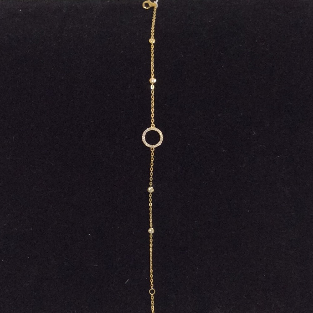 Women’s gold and CZ bracelet